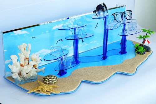 White background studio view of modular acrylic sunglasses display stand